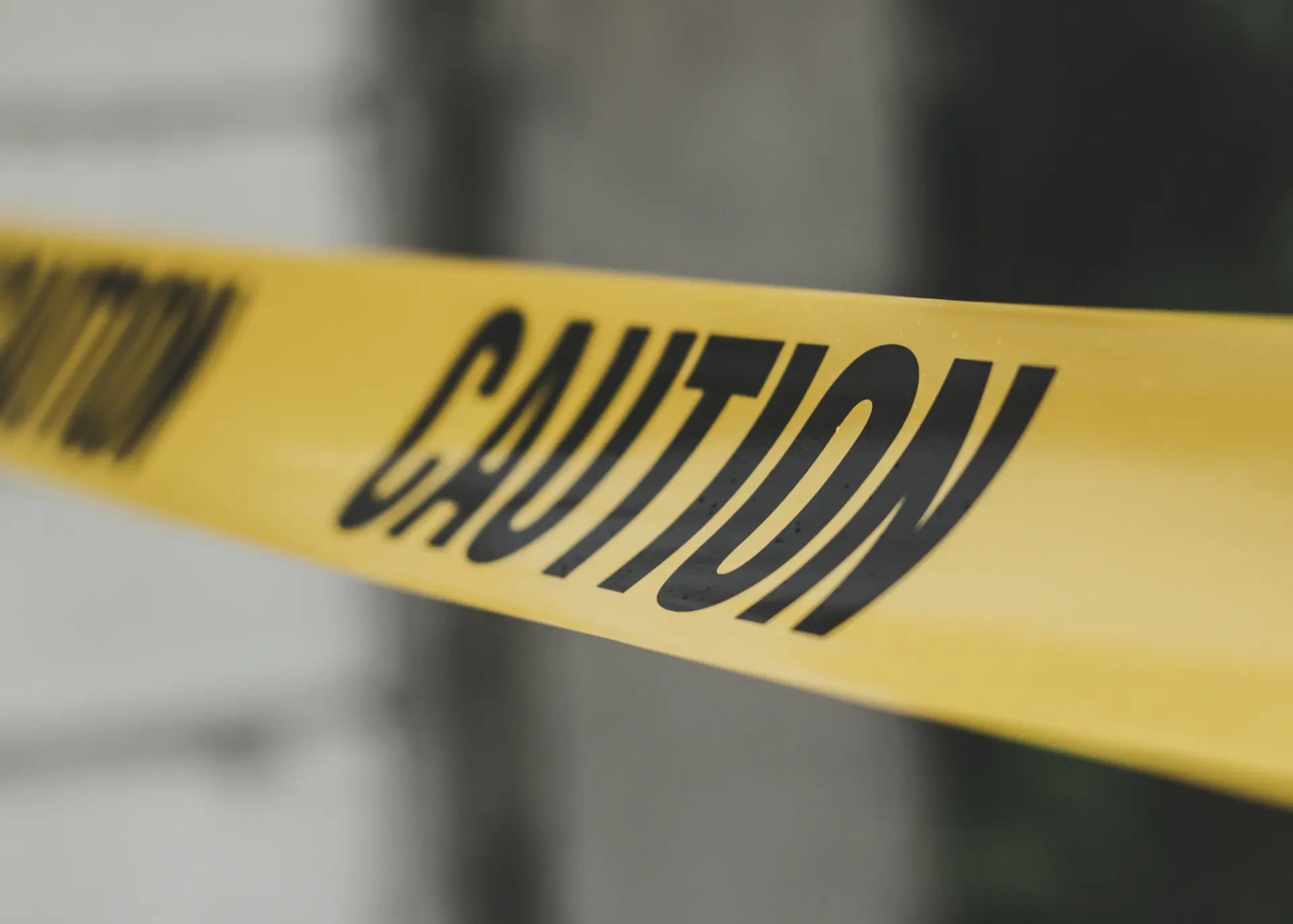 Caution tape marking a restricted area